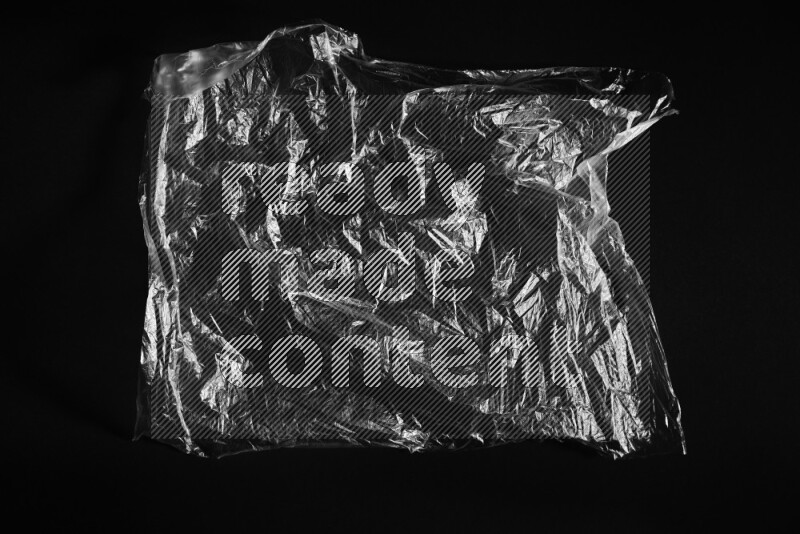Transparent plastic textures on black background