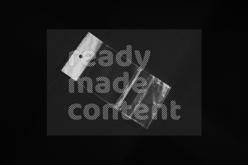 Transparent plastic textures on black background