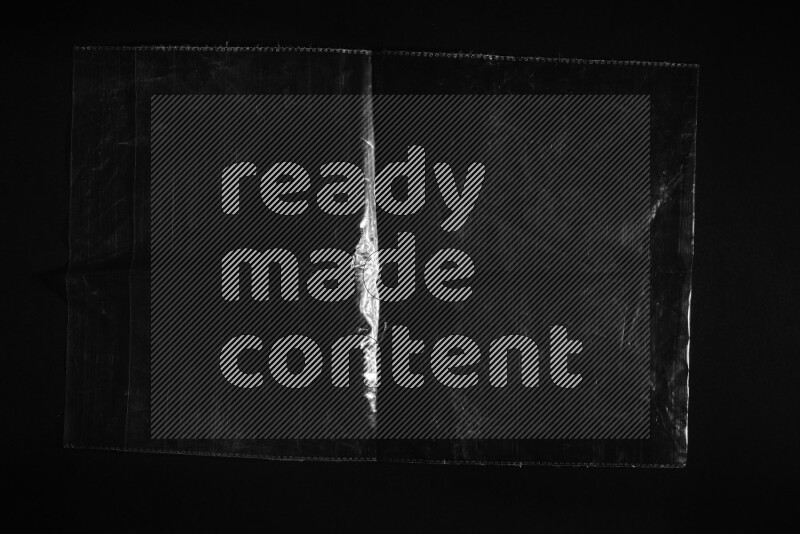 Transparent plastic textures on black background