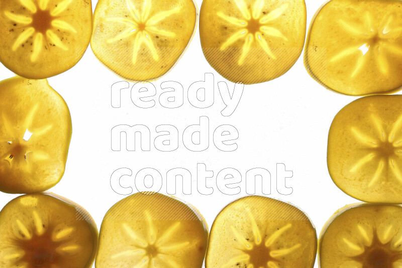 Persimmon slices on illuminated white background