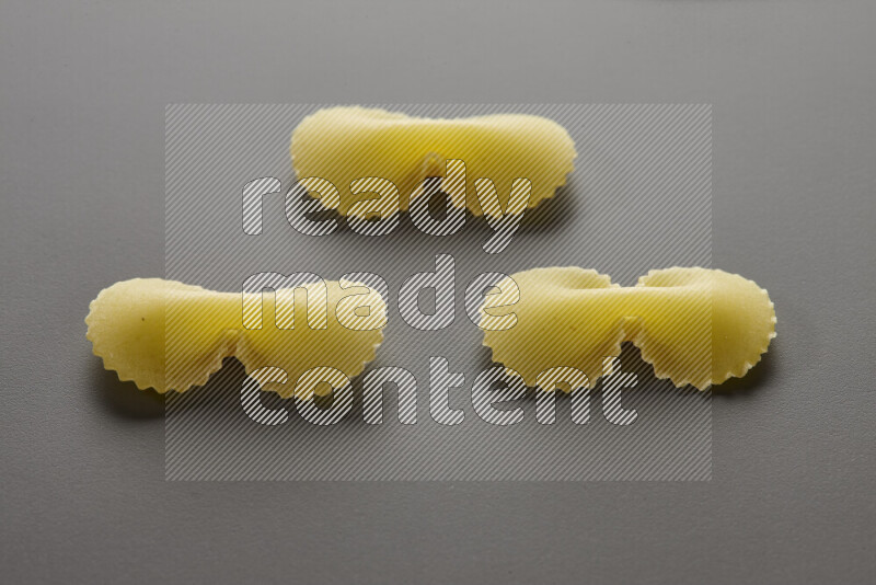 Fiocchi pasta on grey background