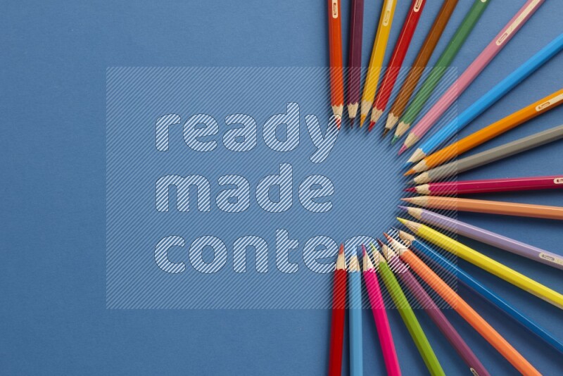 Different school supplies on blue background