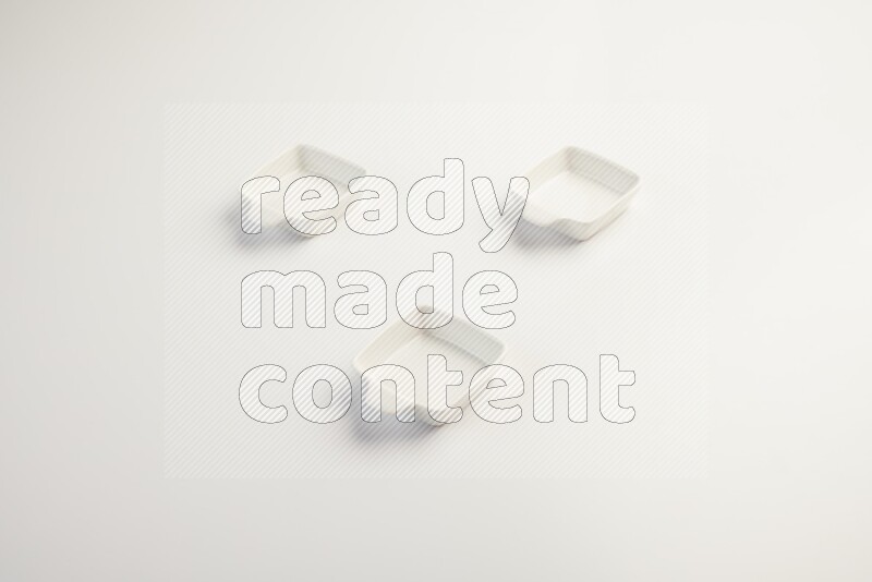 white ceramic square sauce dish on white countertop