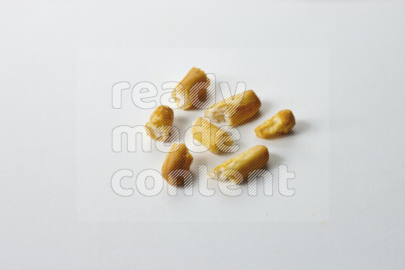 Assorted snacks on white background