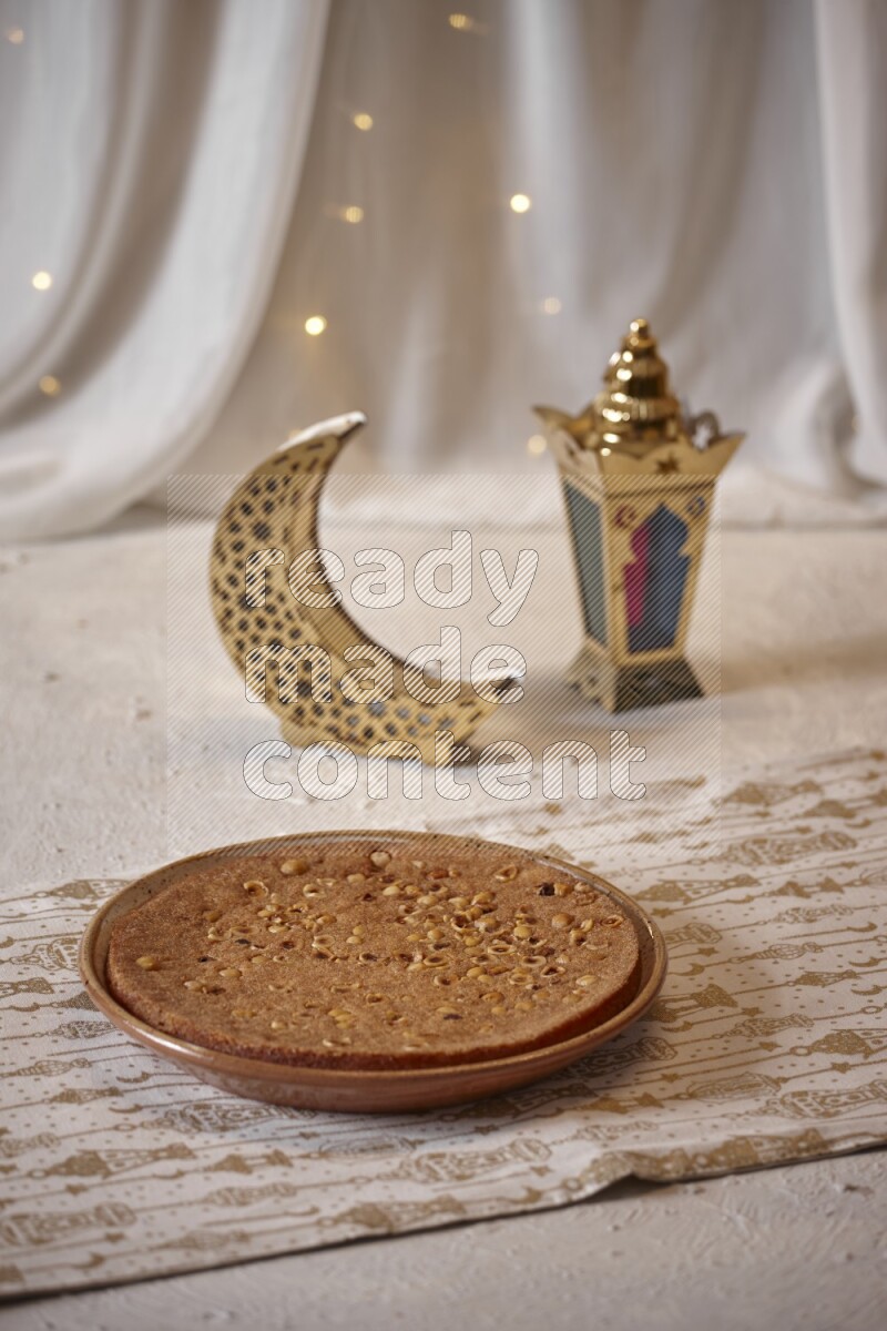 Basbousa with lanterns in a light setup