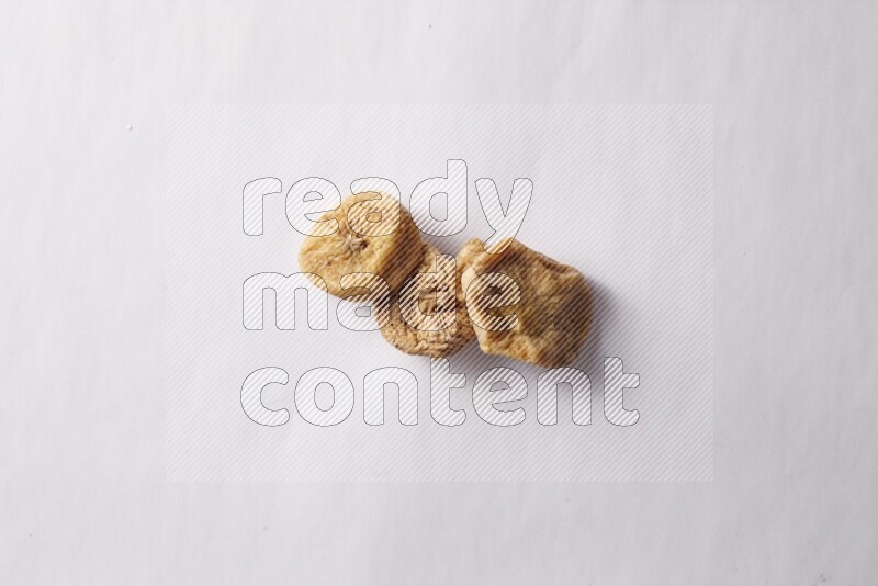 Dried figs on white background