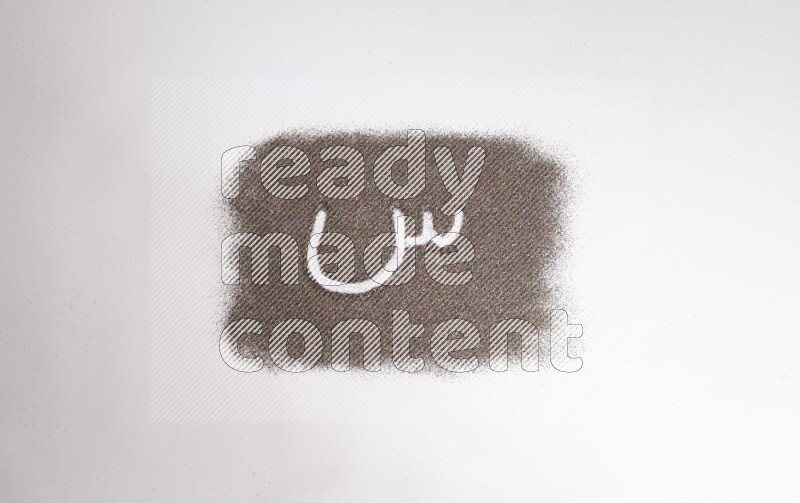 Arabic alphabets written with glitter on white background