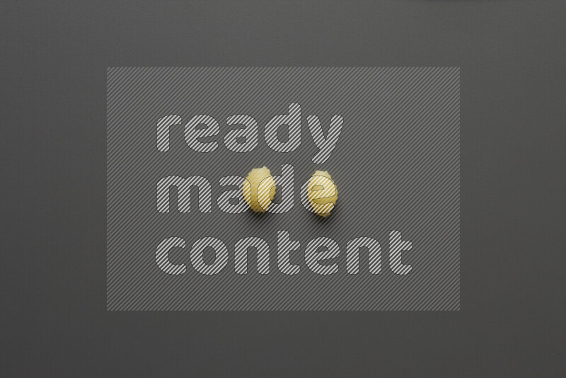 Shells pasta on grey background