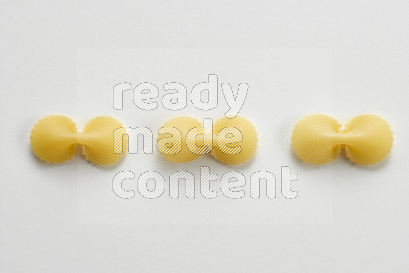 Fiocchi pasta on white background