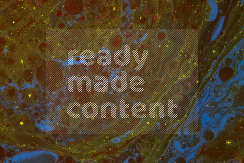 The image depicts a marbling effect with swirling patterns of red, blue and yellow