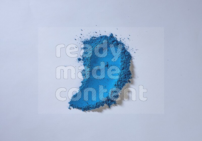 Blue powder strokes on white background