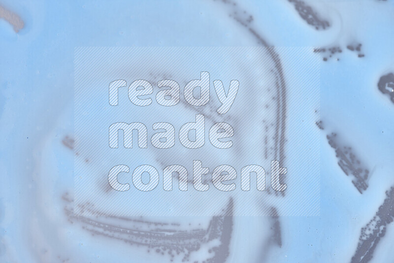 Close-ups of abstract blue paint texture in different shapes