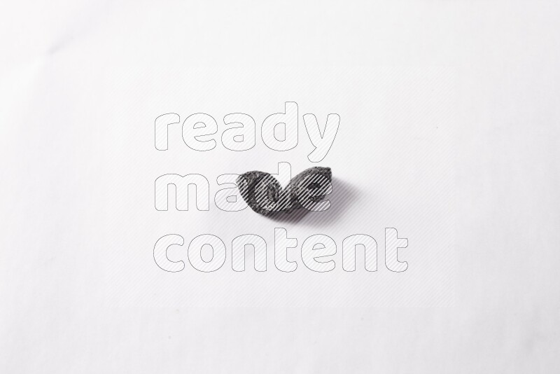 Dried plums on white background