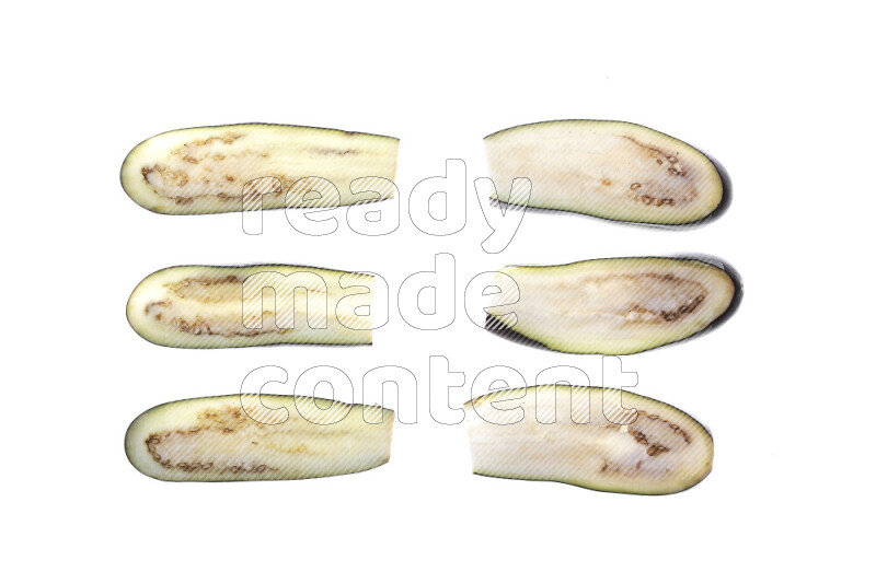 Eggplant slices on illuminated white background