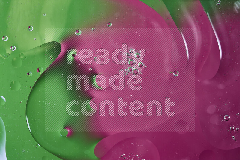 Close-ups of abstract oil bubbles on water surface in shades of green and pink