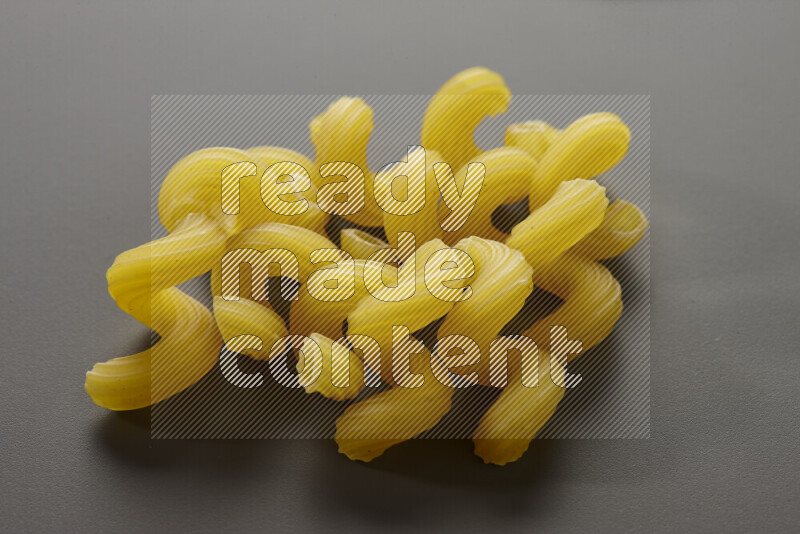Twist pasta on grey background