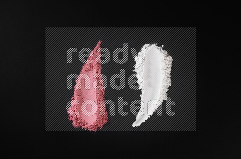 Multicolored powder strokes on black background