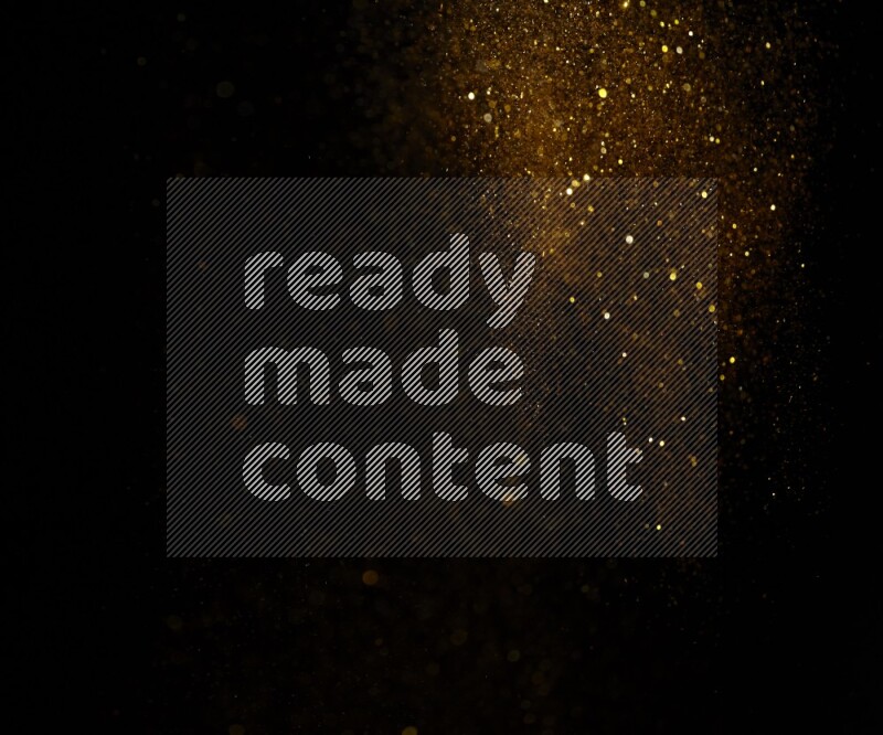 Gold glitter powder isolated on black background