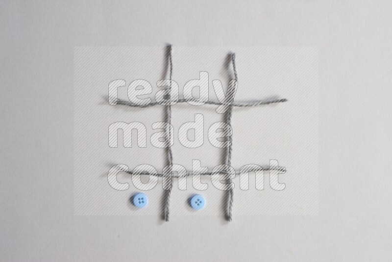 Blue buttons placed on grey background