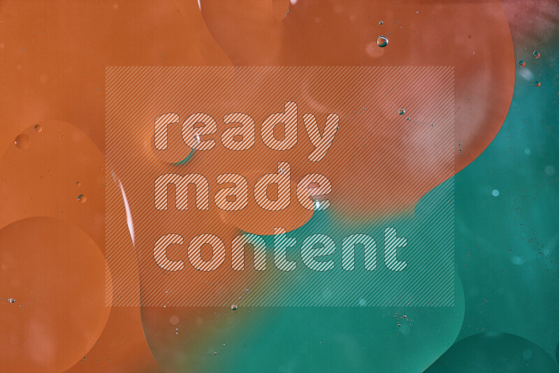 Close-ups of abstract oil bubbles on water surface in shades of green and orange