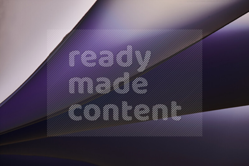 فن تجريدي يعرض منحنيات مع تدرجات الألوان الدافئة والباردة مكونه بضوء ملون