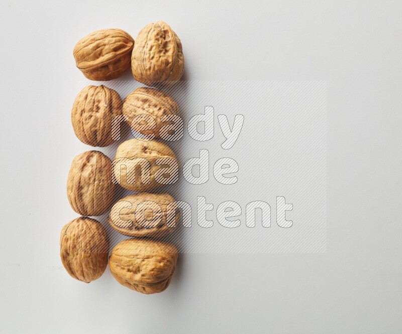 Top-view shot of walnut on white background