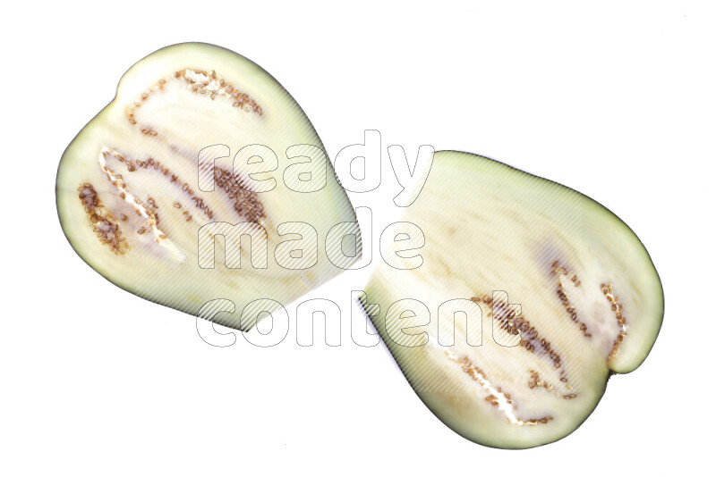 Eggplant slices on illuminated white background