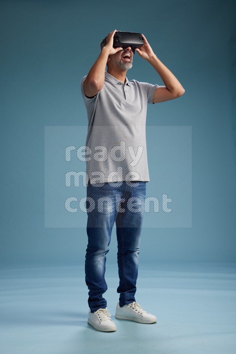 Man Standing Gaming with VR