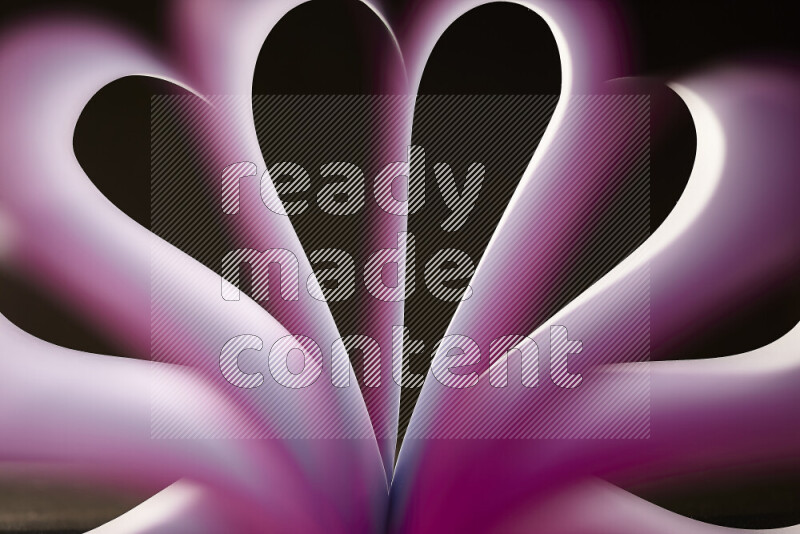 An abstract art piece displaying smooth curves in white and purple gradients created by colored light