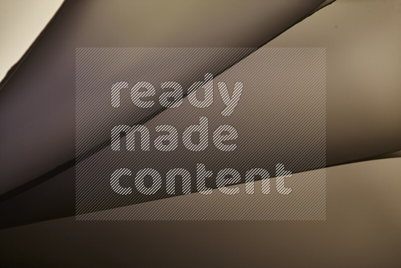 An abstract art piece displaying smooth curves in warm and cold gradients created by colored light