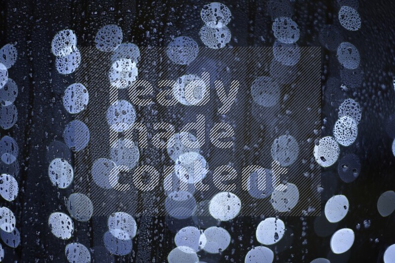 Bokeh light in white with water drops