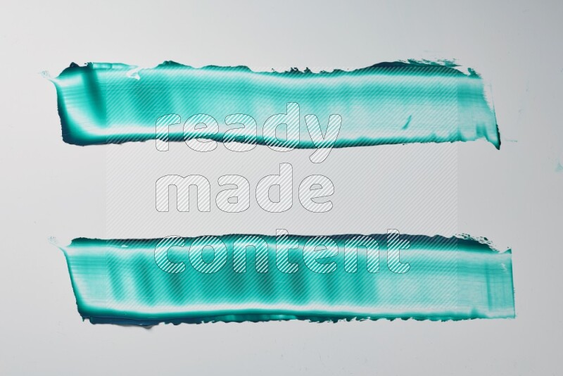 Turquoise painting knife strokes on white background