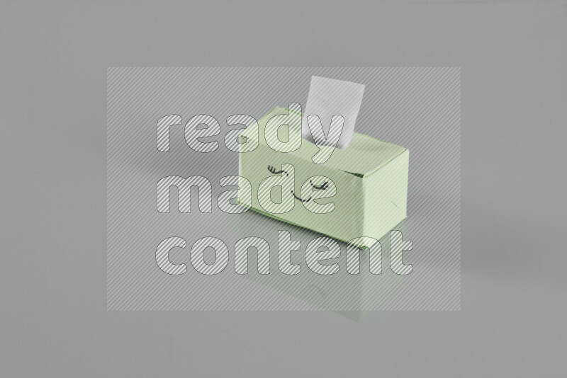 Origami tissue box on grey background