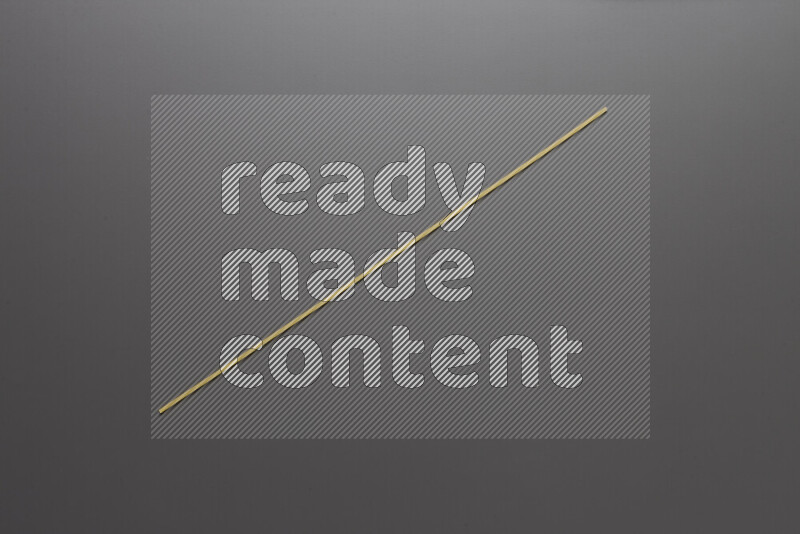 Spaghetti pasta on grey background