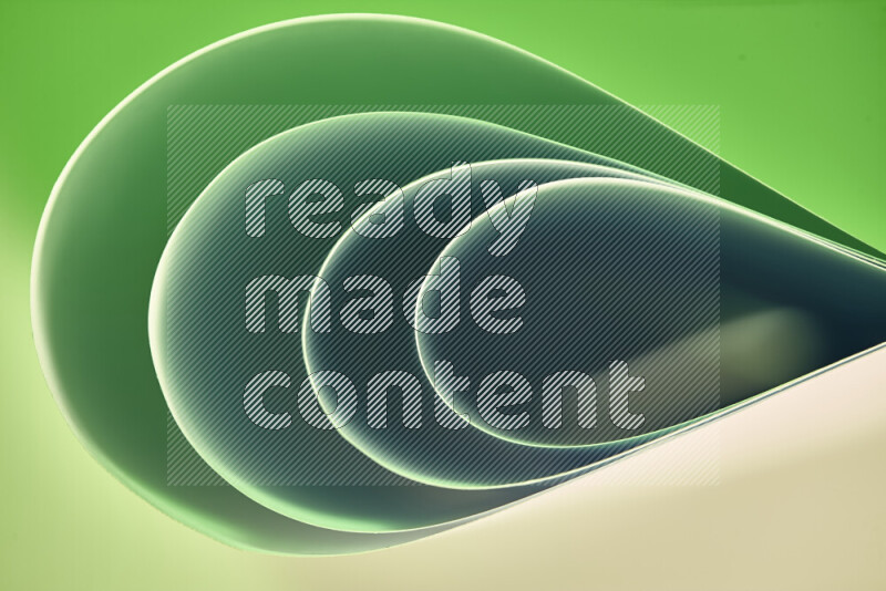 An abstract art of paper folded into smooth curves in green gradients