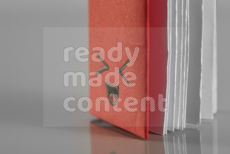 Origami book on grey background