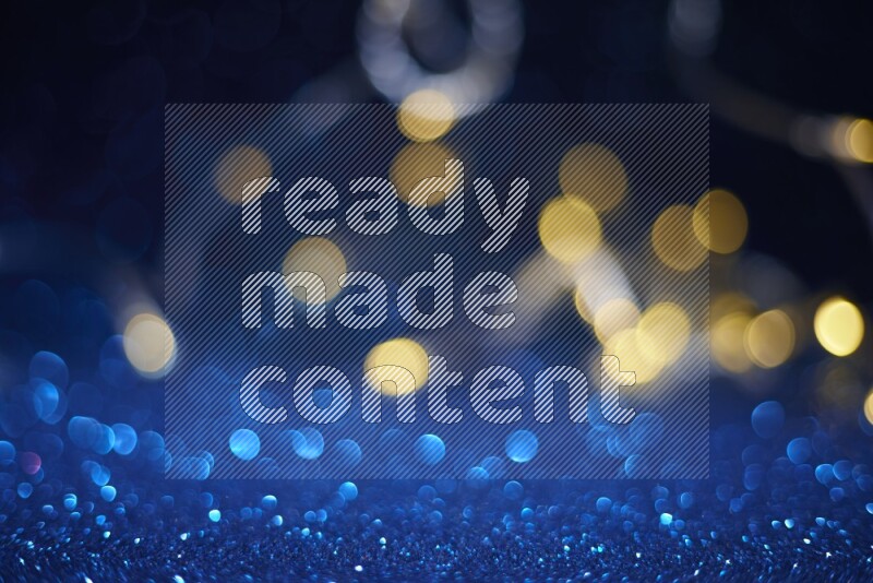 Bokeh light in yellow with blue background