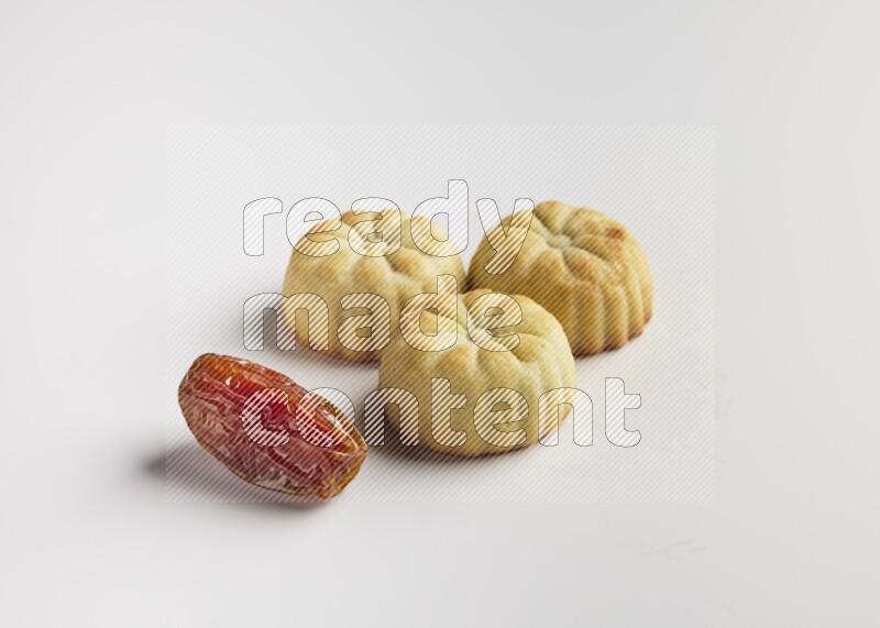 Three Pieces of Maamoul direct on white background