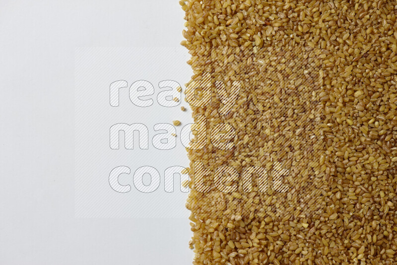 Coarse bulgur on white background