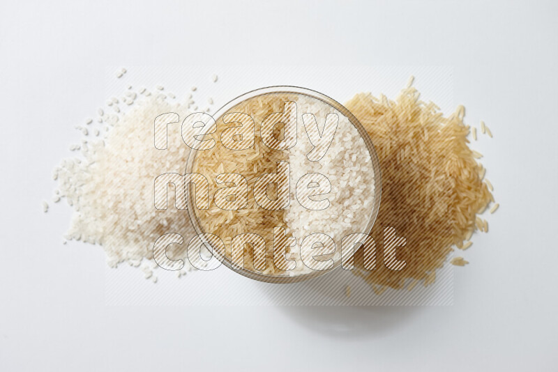 White rice with golden rice on white background