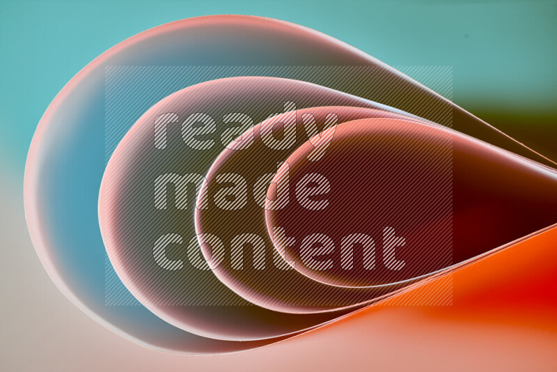 An abstract art of paper folded into smooth curves in green and red gradients