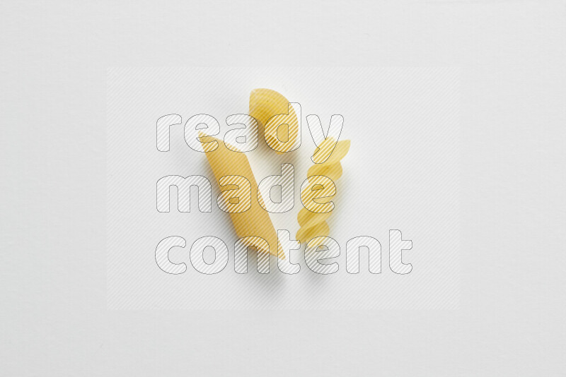 Different pasta types on white background
