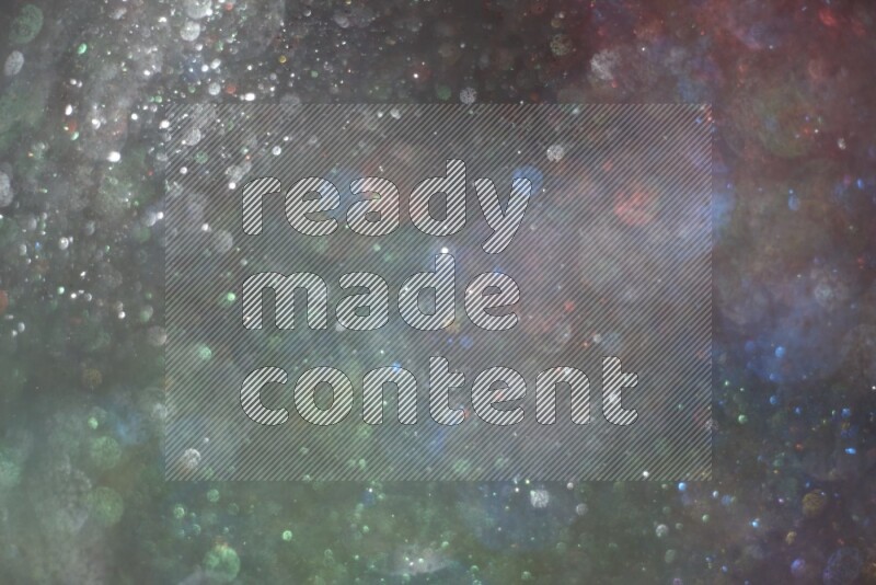 Multicolored glitter powder isolated on black background