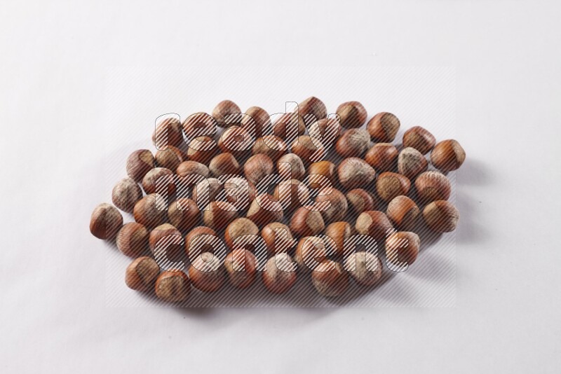 Hazelnuts on white background
