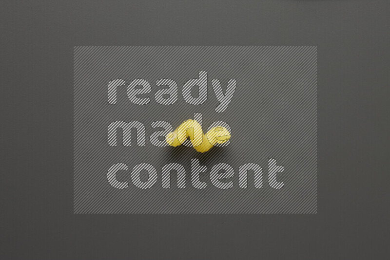 Twist pasta on grey background