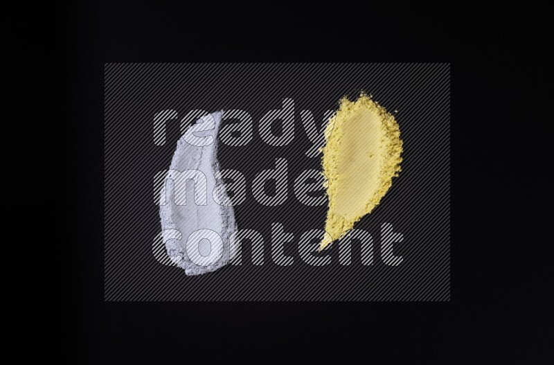 Multicolored powder strokes on black background