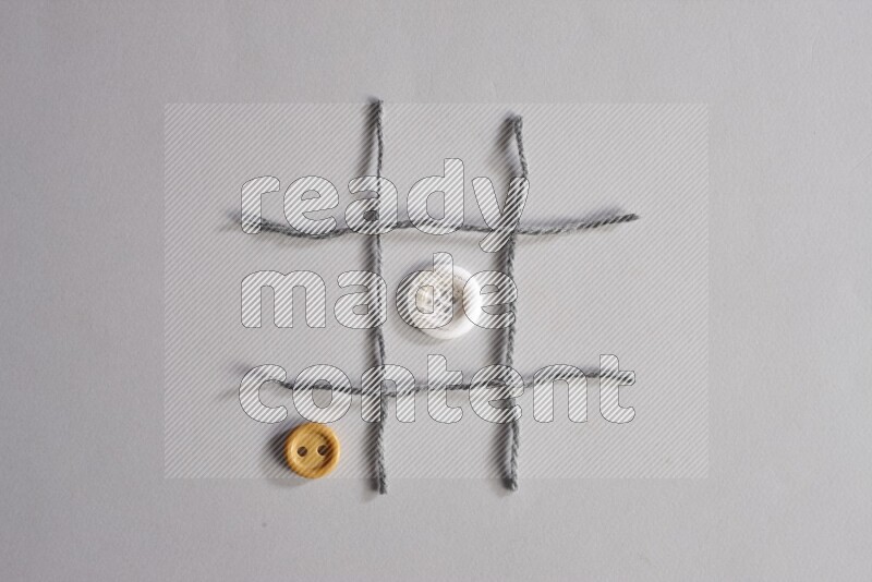 Multicolored buttons placed on grey background