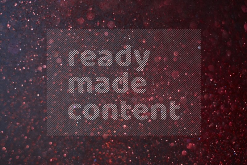 Red glitter powder isolated on black background