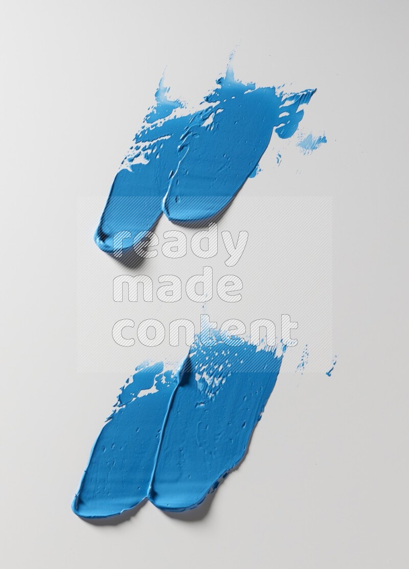 Blue painting knife strokes on white background