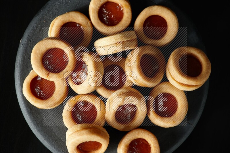 Jam cookies on a black background